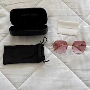 Alexander McQueen Rose-Tinted Sunglasses
Brand new.  Never worn .